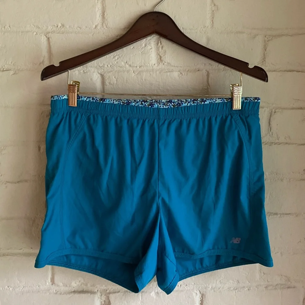 New Balance women’s turquoise blue floral athletic running shorts size medium